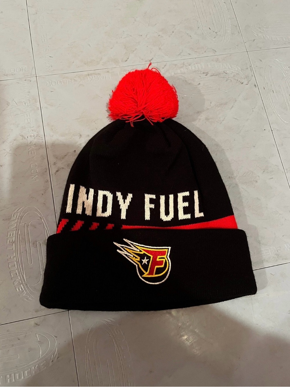 Indy Fuel Black and Red Pom Beanie - Team Knit Hat